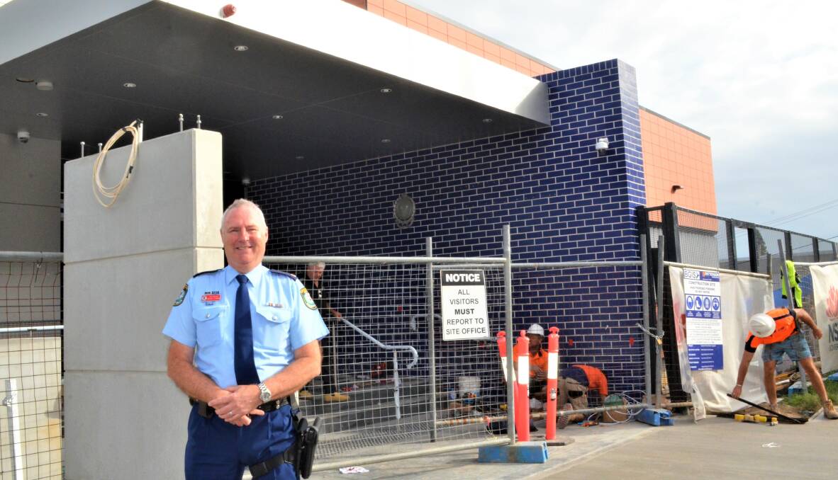 EXCITED: Cessnock Police Station officer-in-charge, Chief Inspector Michael Gorman at the entry to the new police station. Picture: Krystal Sellars
