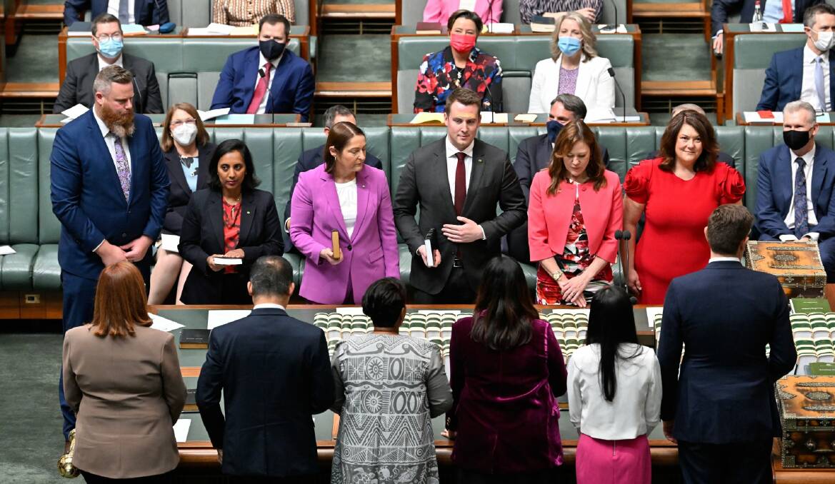 OFFICIAL: Federal MPs including Dan Repacholi (Hunter, at left) and Meryl Swanson (Paterson, at right) are sworn in at Parliament House on Tuesday. Picture: Auspic