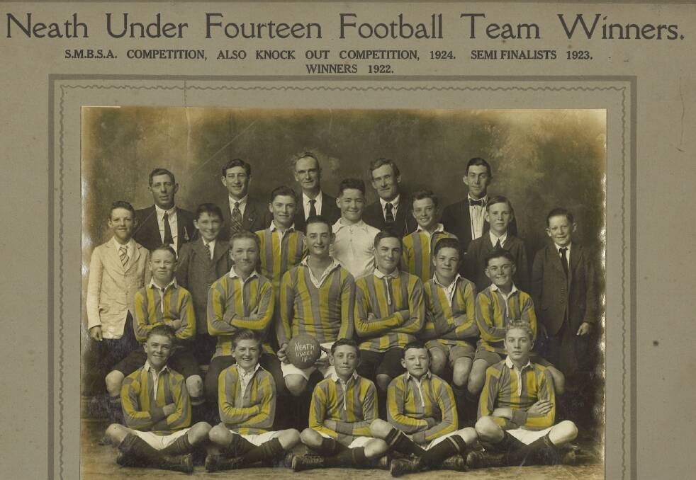 JUBILATION: The Neath under-14 football team (pictured) won the competition in 1922.
Back row: J Turner, secretary and coach; T Turner, A Horne, J Roddom, Treasurer; J. Pickering.
Standing: A Bartley, J Purcell, G Hinchcliffe, J Scanlon, C Rouse, E Robinson, A Roddom.
Sitting: A Whitsun, K Russell, A Horne (capt), C Purcell, W Leighton, J Hartley.
Front row: C Burnett, G Stevens, J Roddom, J Greig, A Matchett.
Picture: Cessnock City Library Local Studies Collection
