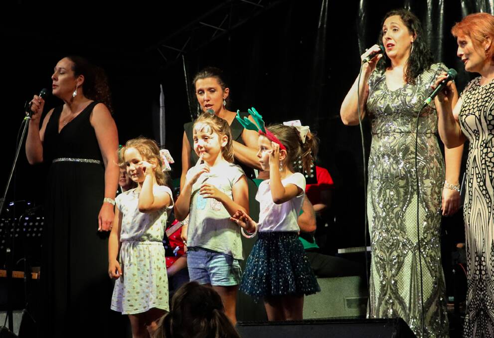 SING: Santa's Little Helpers will provide the entertainment at Cessnock's Carols in the Park this Friday night.