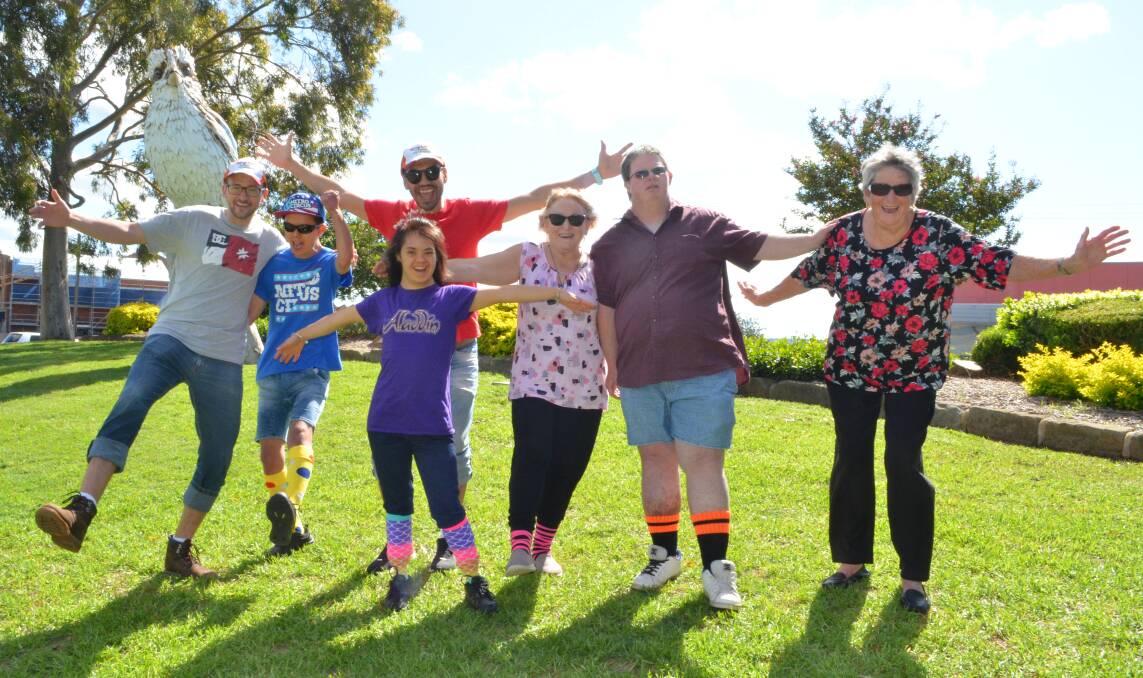 EMPOWERING: Support workers Kenny Sousa and Vinnie Riego, with Jordyn and Jessika Threlfo and their mum Dee, Shannon Smith and his mum Margaret Griffiths.