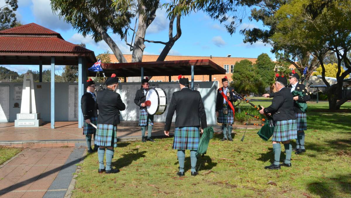 PHOTOS: Cessnock District Pipes and Drums Band performs on VP Day 75th anniversary