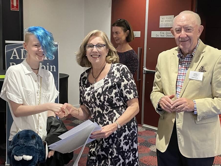 SUPPORT: Cessnock High student Claire Davies receives the scholarship from ADFAS Pokolbin young arts coordinator Debra McGuigan and chairman, Professor Bob Lusby.