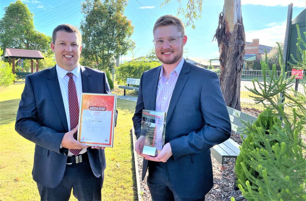 DEDICATION: Cessnock mayor Jay Suvaal presented citizen of the year Jordan Fallon with his award at the Kearsley Remembrance Garden on Monday. Picture: Krystal Sellars