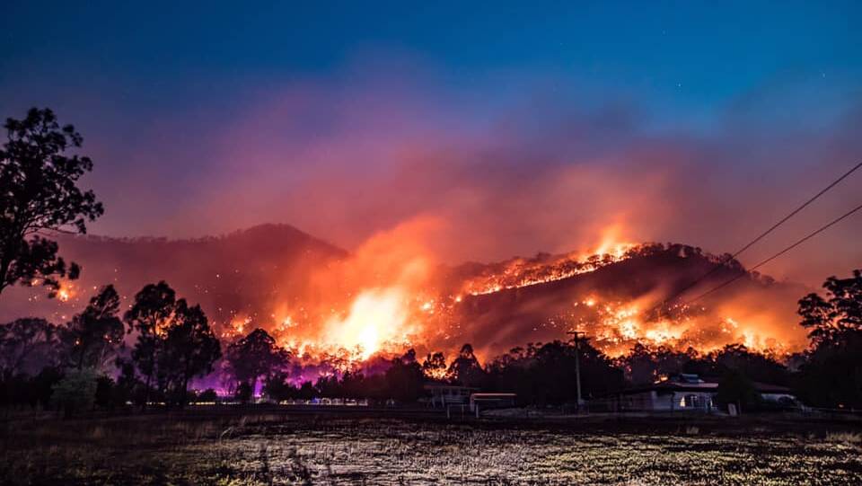 INFERNO: Backburning operations as seen from Milbrodale Road, Broke on December 27. Picture: Corey Solomons, OOO Photography