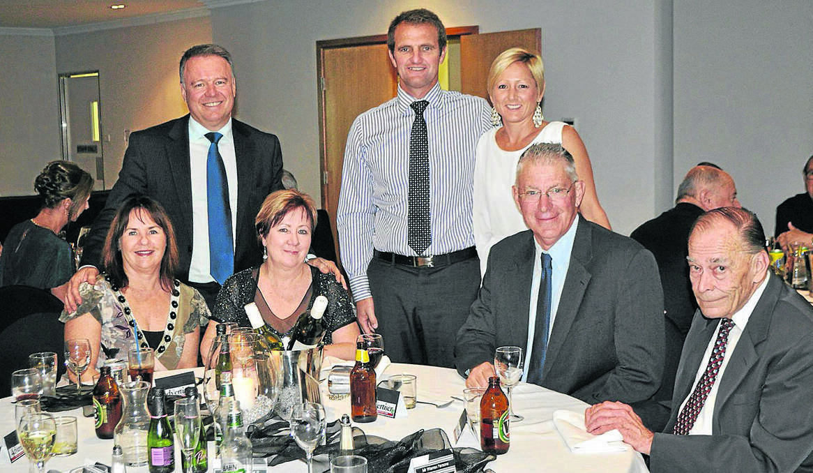 RESPECTED: Stan Neilly (right), pictured with Dianne and Joel Fitzgibbon, Kathy Pynsent, Clayton and Lisa Barr, and Bob Pynsent, at former Advertiser editor Bruce Wilson's retirement dinner in 2012.