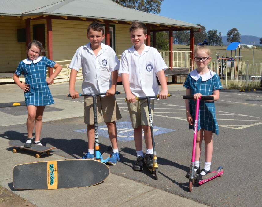 A PLACE TO PLAY: Milla Vaughan, 8, Oscar Vaughan, 11, Cooper Wing, 8, and Macy Wing, 6, are excited about the plans for a skate park to be built at Crawfordville Park, Millfield. Picture: Krystal Sellars