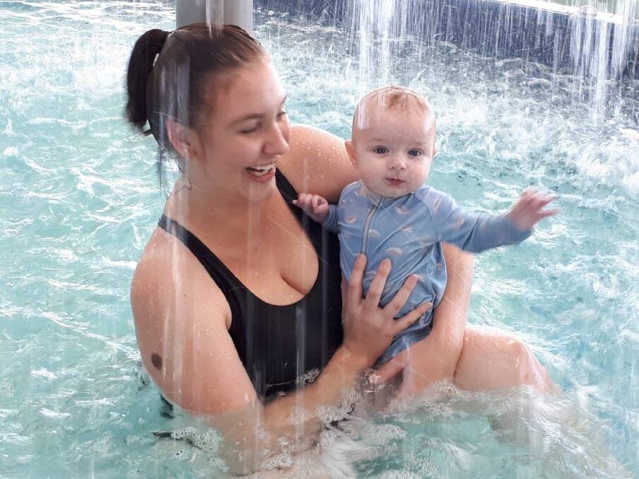 SPLASH: Lauren Porteus and her son Xavier at Kurri Kurri Aquatic and Fitness Centre, which will offer free lessons for kids under five during Learn2Swim Week.