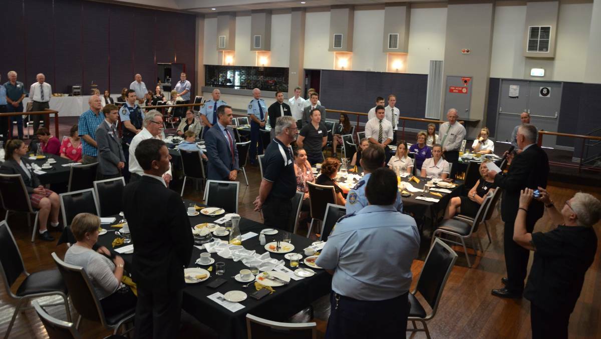 IMPORTANT MESSAGE: Guests take the White Ribbon pledge at the Cessnock Chamber of Commerce breakfast in 2016. The chamber will hold a COVID-safe breakfast on October 13, with a focus on domestic violence and mental health.