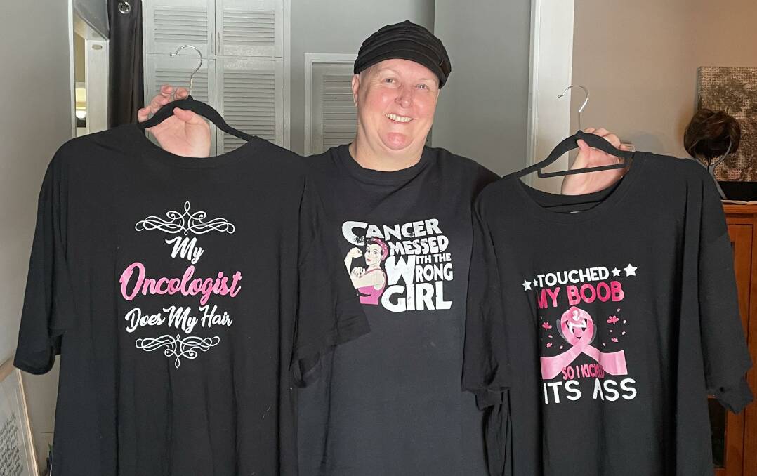 EMPOWERING: Cessnock resident Tracey Duncan with some of the breast cancer awareness T-shirts she has bought since she was diagnosed in May this year. Picture: Krystal Sellars