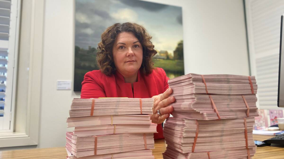 SIGNED, SEALED, DELIVERED: Meryl Swanson pictured with Medicare petitions.