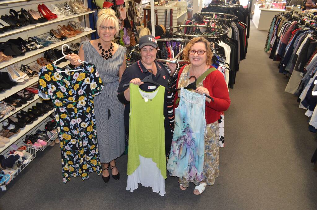 FASHION: Donna Searle and Suzanne Schroder, of Cessnock Congregational Church, with Salvation Army Cessnock store manager Erin Copeland (centre).