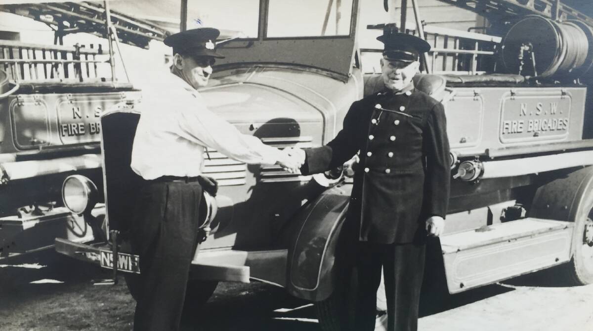 LOCAL LEGEND: Alex Frame's photograph of his father Edward John 'Bluey' Frame (right) receiving a new fire truck at the Weston station, circa 1950s.