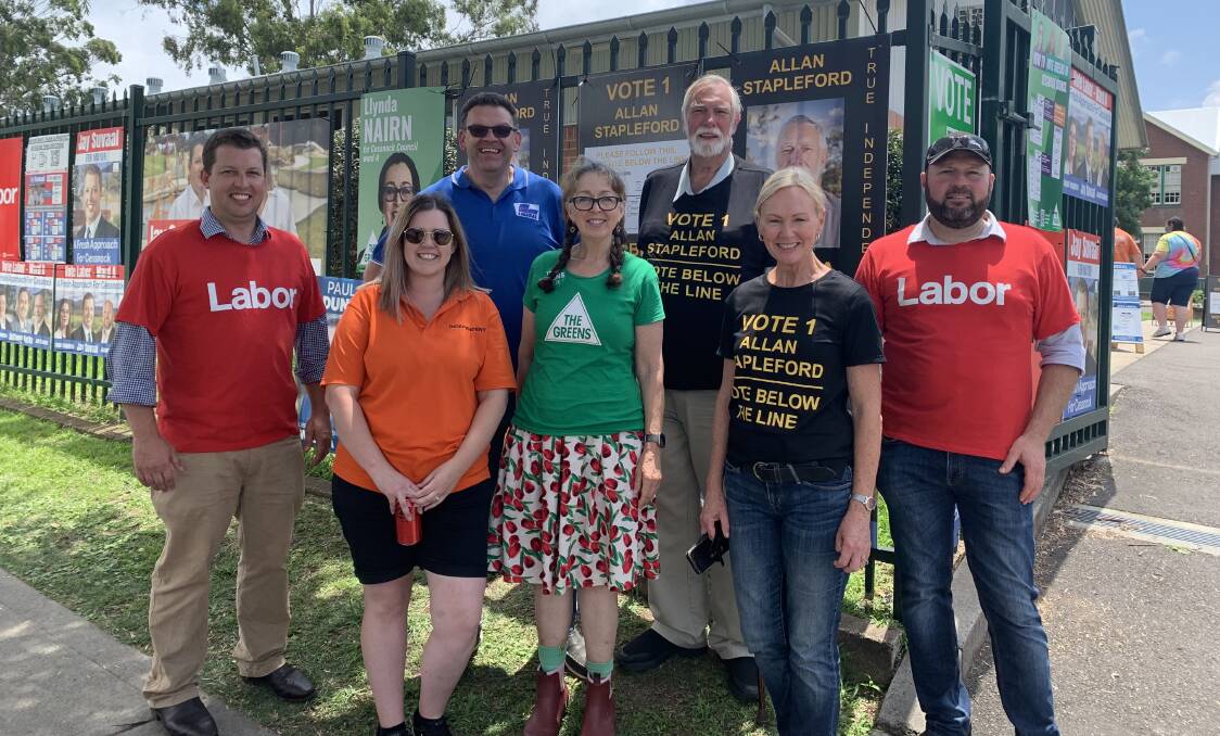 Ward A candidates and supporters at the Cessnock West Public School booth on Saturday