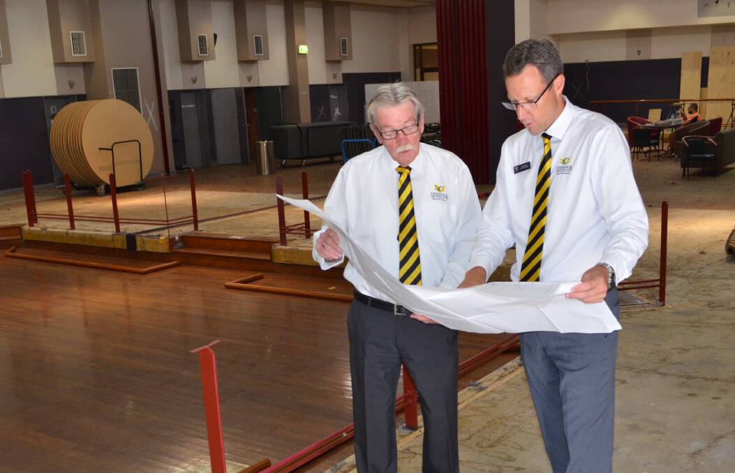 BIG PROJECT: Cessnock Leagues Club president Bruce Wilson and CEO Paul Cousins look over the club's renovation plans. Picture: Krystal Sellars