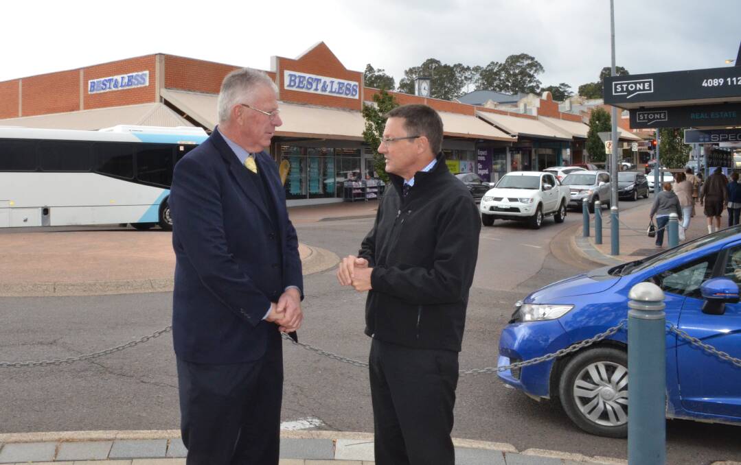 PROGRESS: Cessnock mayor Bob Pynsent and Parliamentary Secretary for the Hunter Scot MacDonald at the intersection of Cooper and Charlton Street, Cessnock, where some of the work will take place. Picture: Krystal Sellars