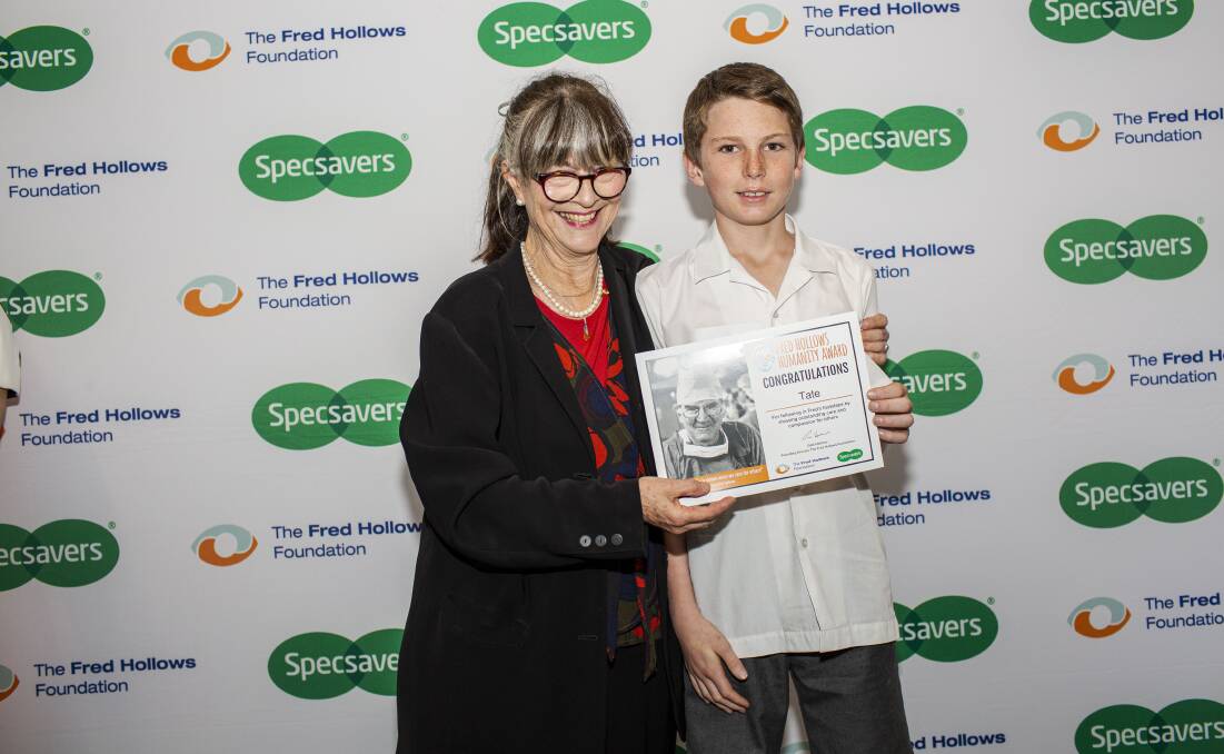 KIND: Gabi Hollows presents St Philip's Cessnock student Tate Brabander with his Fred Hollows Humanity Award.