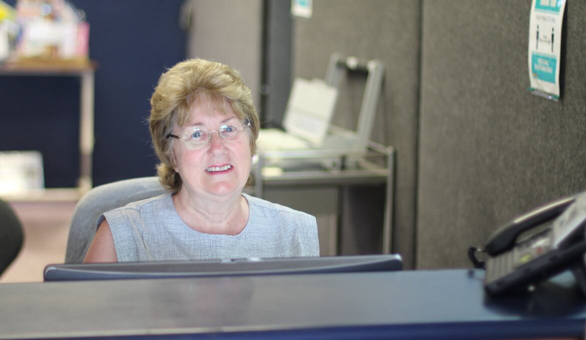 WARM WELCOME: Katherine Ryan has worked on the reception desk at Calvary Cessnock Retirement Community for the past 20 years. 
