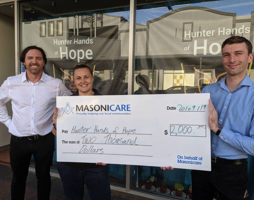 HELPING HAND: Jason Bridge (Masonicare caring officer), Melissa Gontier (Hunter Hands of Hope president) and Max Katz-Barber (Worshipful Master of Lodge Cessnock) at the cheque presentation. Picture: supplied