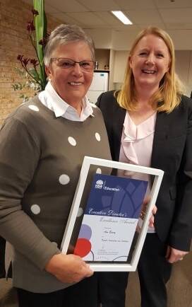EXCELLENCE: Cessnock West Public School teacher Ann Barry (left) is congratulated by principal Ruth Goodwin on receiving the Director's Excellence Award.
