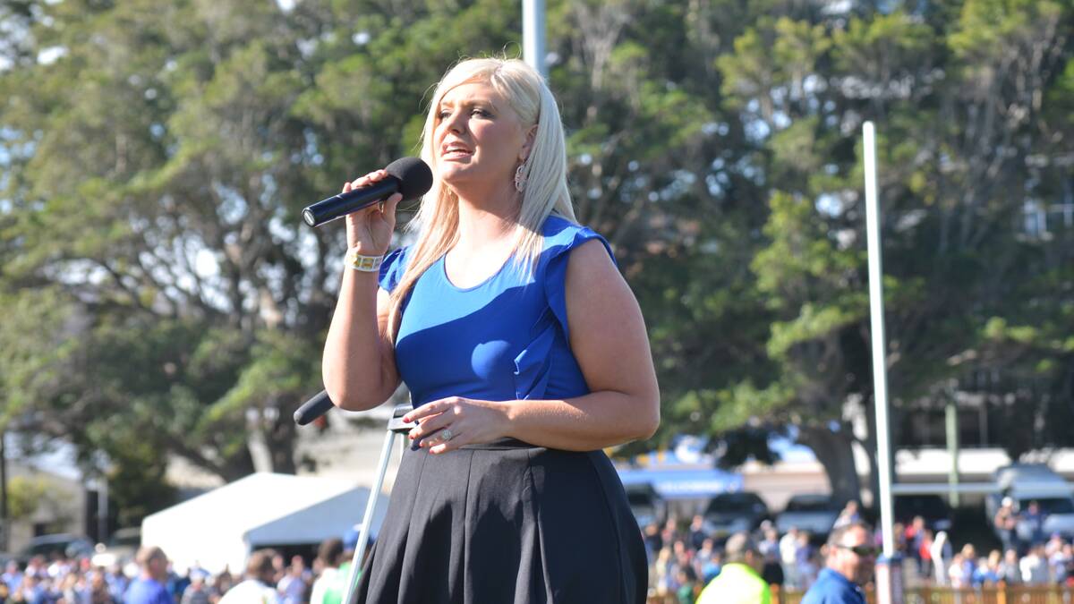 VOICE: Amanda Barrass performing the national anthem at the 2014 Newcastle Rugby League grand final. Picture: Krystal Sellars