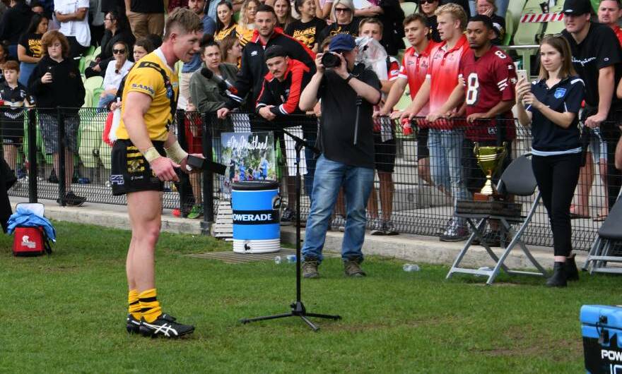Connor Kirkwood receives the player of the final award. Picture: Michael Hartshorn