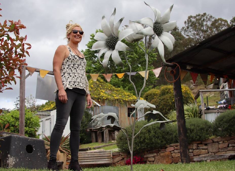 SUCCESS: Wollombi artist Amanda Lockton, with her entry Actinotus Helianthi, one of the sculptures that was sold during the online festival. Picture: Nick Glover