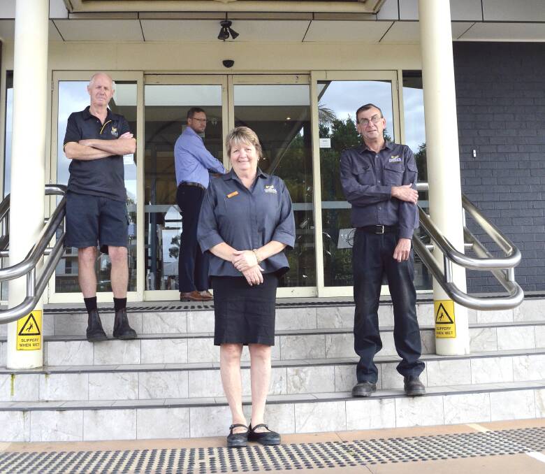 DOORS CLOSED: Cessnock Leagues Club staff Richard Green, Paul Cousins, Debbie Kinch and Steve Orr after the club closed its doors on Monday.