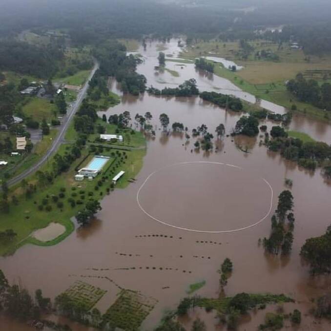 A drone image of flooding at Laguna. The white circle is a picket fence at the village's cricket ground. Picture: Peter Cole (supplied by Wollombi Tavern)