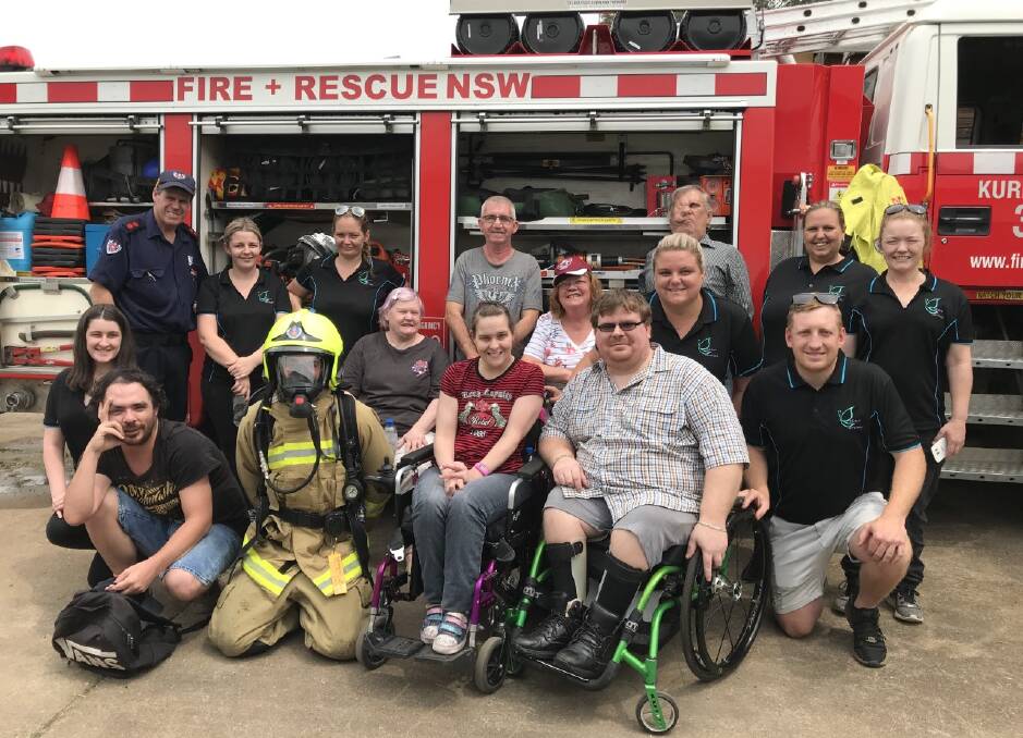 AMAZING DAY: Believe Services clients and Kurri Kurri Fire Brigade members at the Firefighter for a Day activity at Weston Fire Station on October 30.