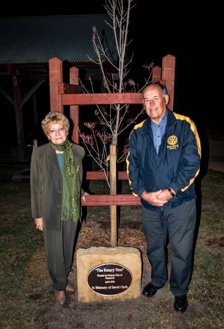 MEMORY: David Clark's wife Judy and Cessnock Rotary Club president Graham Farish at the unveiling of the memorial tree at Poppethead Park. Picture: George Koncz