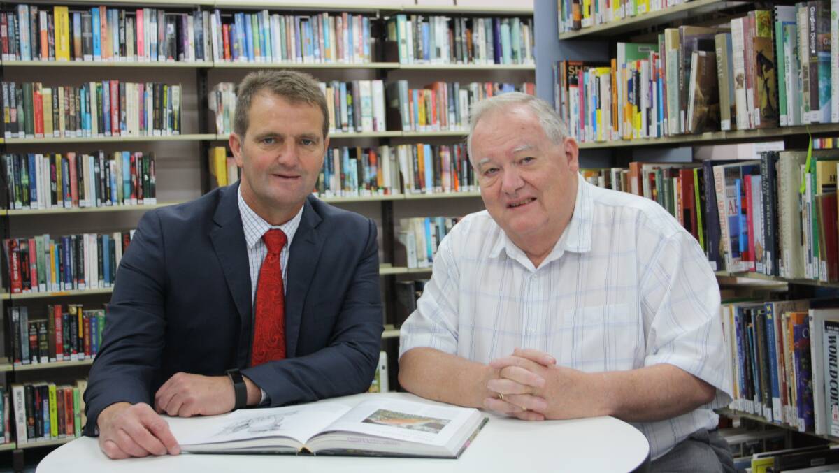 FUNDING PUSH: Cessnock MP Clayton Barr discusses Labor's libraries policy with past president of the NSW Public Libraries Association, Graham Smith, at Kurri Library.
