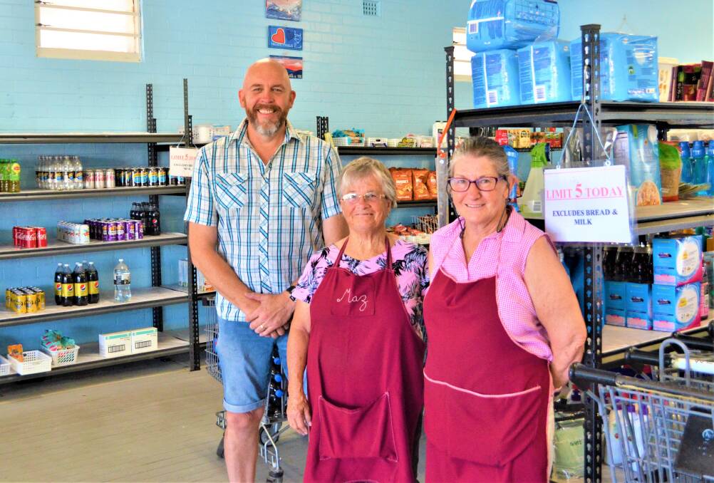 HERE TO HELP: Kingdom Community Church's Pastor Paul DeWildt and Weston Food Care volunteers Marilyn Conn and Bev Donnelly.