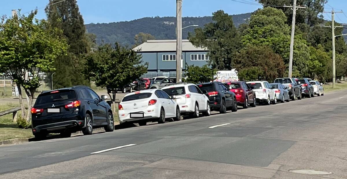 TESTING TIMES: Cars lined up at the Laverty Pathology COVID testing clinic on Mount View Road on Monday morning.