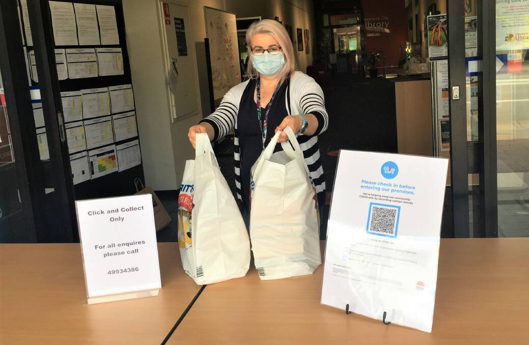 SERVICE: Library assistant Sian Membrey delivers a click and collect order to the door at Cessnock Library.