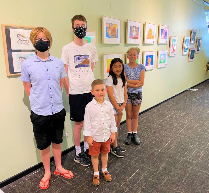 EXHIBITION: Casscar Arts Studio students Isaac Maloney, Ethan Butcher, Preston Edwards, Athena Pattamaprapanon and Sylvie Romeyn with some of the works on display at Cessnock Library through December and January.
