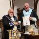 STEPPING UP: Right Worshipful Brother Peter Frame presents Lodge Paxton's new Worshipful Master Peter Pratt with his installation certificate. Picture: Bryce Gibson