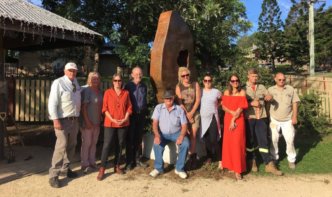 PROUD MOMENT: Sculpture in the Vineyards organisers, artists and supporters, including Peter Hamshere, Jane Hamshere, Susan Leith-Miller, Paul Selwood, Lindsay Self, Amanda Lockton, Laura Heslop, Stephanie Raco, George Copeland and Albert Kraan, after Lost Language was installed near the Wollombi Museum on March 10.