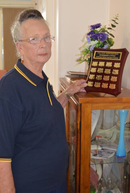 SURPRISE WIN: Yvonne Wilkinson with the Rosemary Lyttle trophy.
