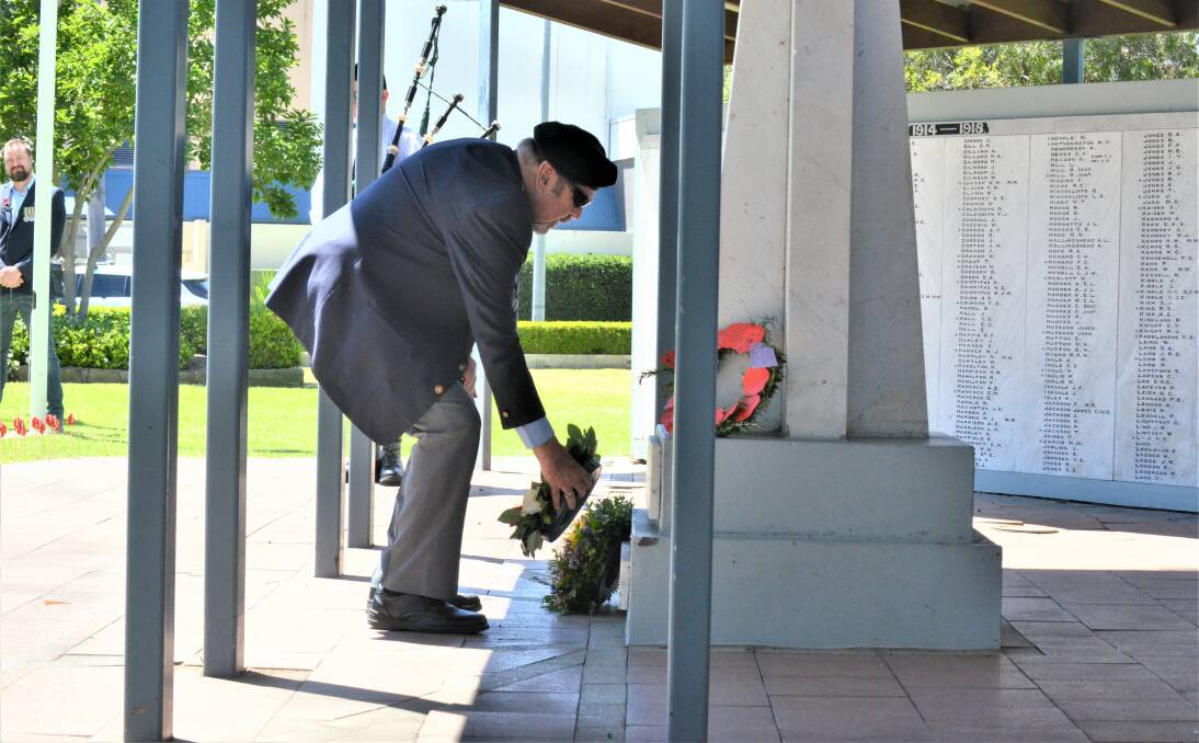 TRIBUTE: Cessnock RSL Sub-branch secretary Dave Owens lays a wreath at the Remembrance Day service on Wednesday. Picture: Krystal Sellars