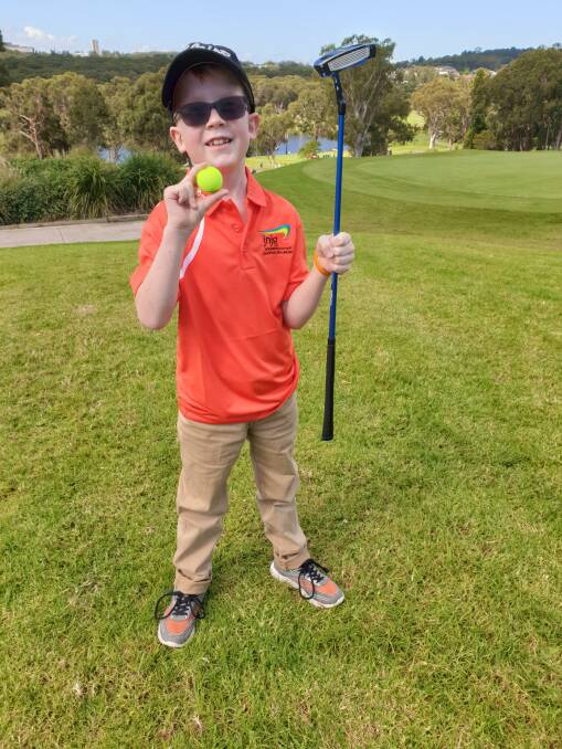DETERMINED: Hamish McClellan, 9, doesn't let neurofibromatosis stop him from enjoying activities and sports, especially golf.