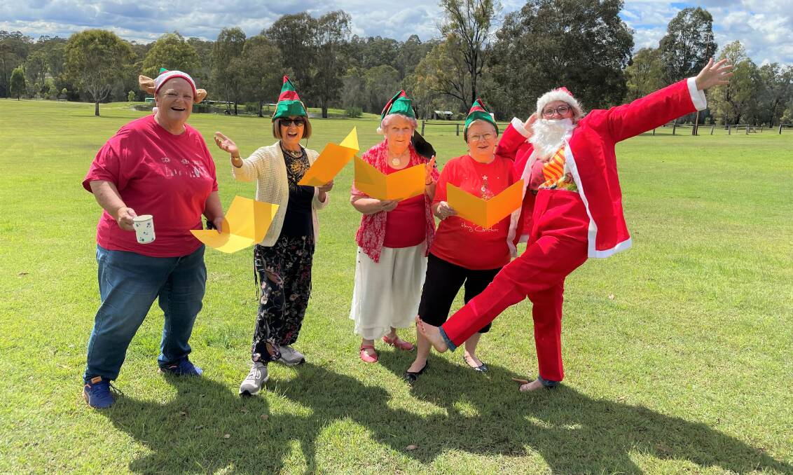 MERRY AND BRIGHT: Cessnock-Bellbird Uniting Church parishioners Pam, Norma, Cynthia, Kerry and Anne are looking forward to the carols at Pokolbin. Picture: Krystal Sellars