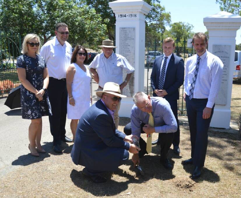 PIECE OF HISTORY: Minister for Veterans Affairs David Elliott and Cessnock mayor Bob Pynsent (front) collecting soil for the Anzac Memorial Centenary Project at the Aberdare Memorial Gates on Tuesday, joined by Cessnock councillors Melanie Dagg, Paul Dunn, Di Fitzgibbon and Rod Doherty; Liberal MLC for the Hunter Taylor Martin and Cessnock MP Clayton Barr. Picture: supplied