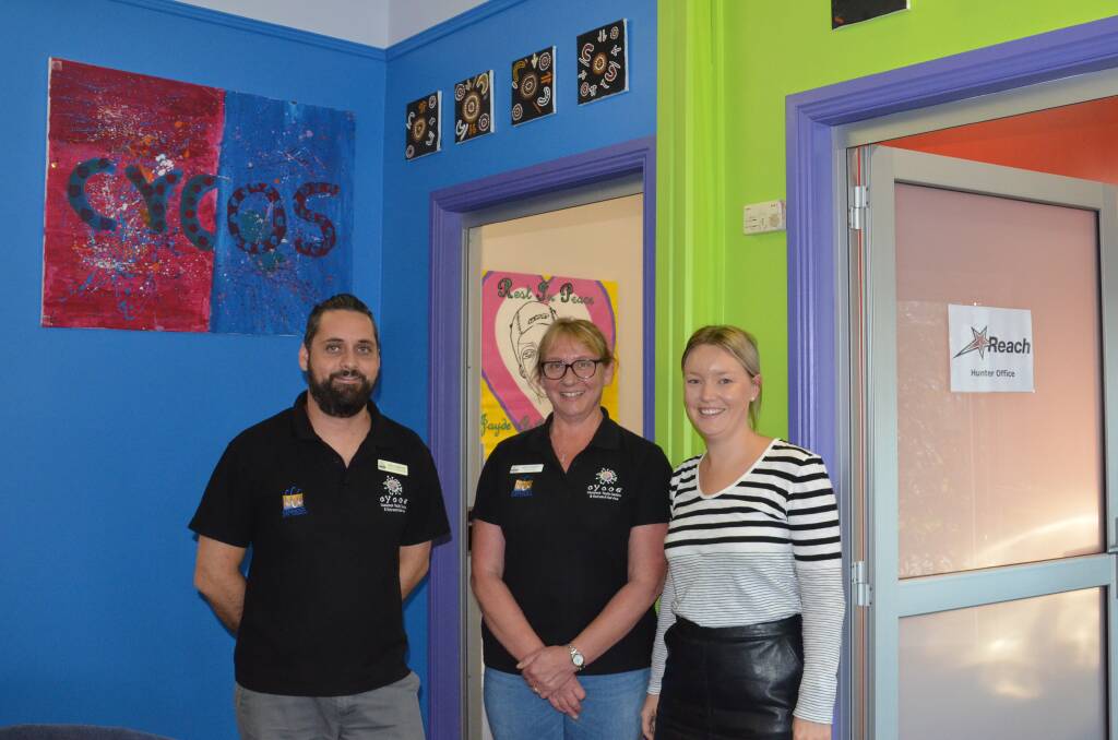 FRESH NEW LOOK: Cessnock Youth Centre and Outreach Service coordinator Will Doran and youth worker Kate Warner, and Reach Foundation regional manager Emily Cant in front of the revamped offices.