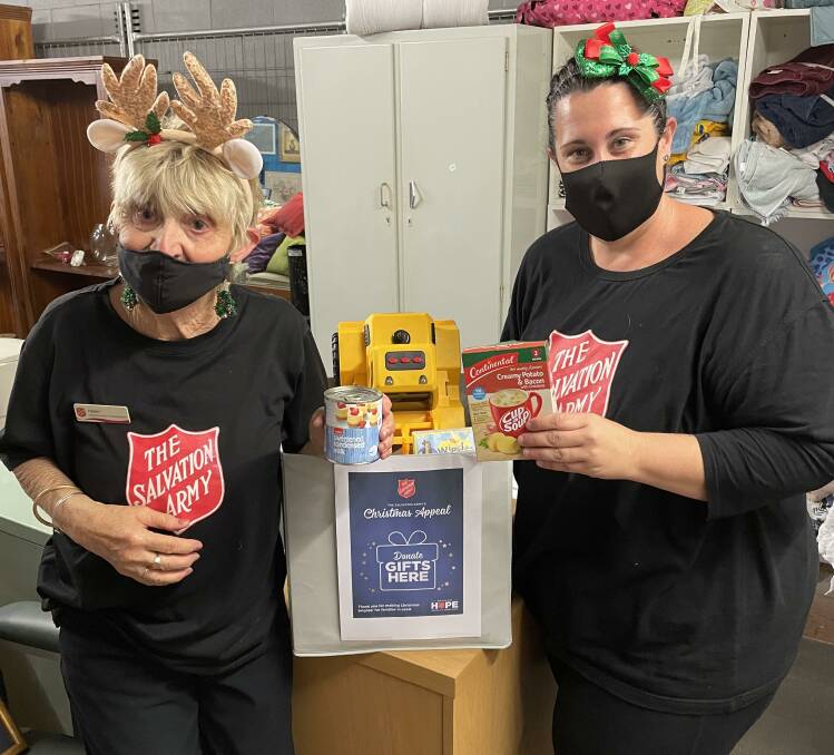 GIVING: Salvation Army Cessnock volunteer Helen Walker-McCready and store manager Erin Copeland with some of the items that have been donated to the appeal.