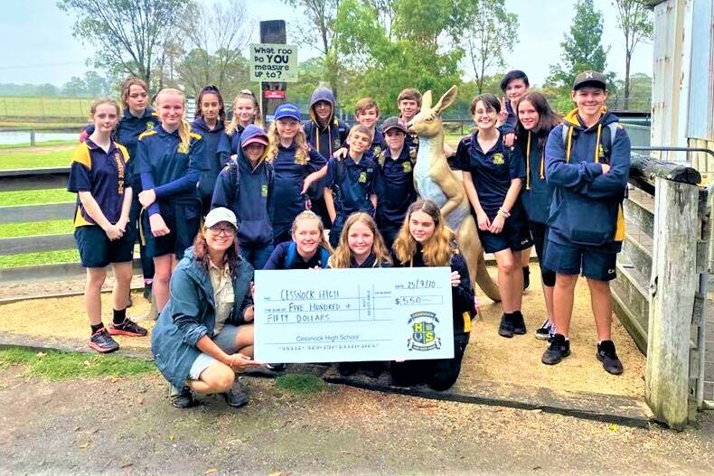 SUPPORT: Cessnock High School's Year 7 CASE class visited Hunter Valley Zoo to present their donation of $500, which was raised via the Return and Earn scheme.