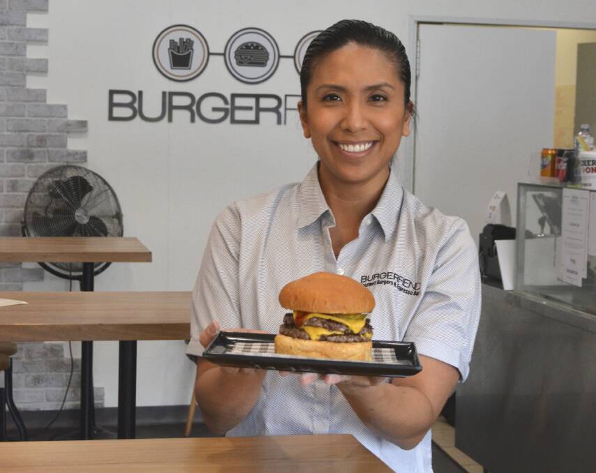 CHALLENGE: Burgerfiend owner Marlene Fulham encourages locals to take part in the Chomp at Stomp eating competition. Picture: Krystal Sellars