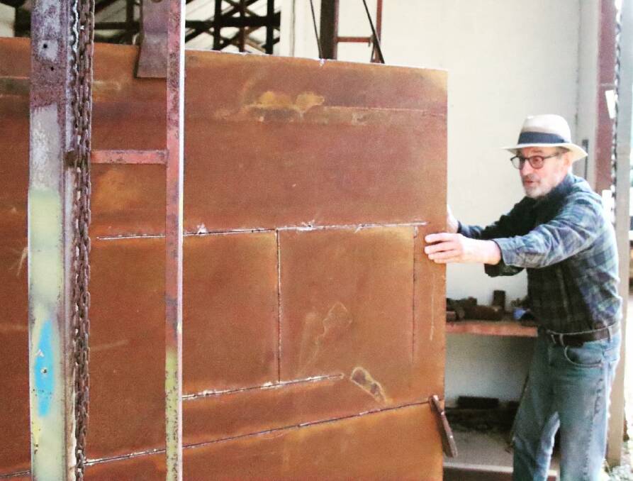 CREATION: Wollombi artist Paul Selwood working on one of his pieces that will feature in the 2021 Wollombi Valley Sculpture Festival. Picture: Nick Glover