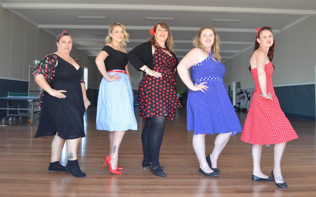 RETRO: Rebecca Prowse, Cassie Brady, Vanessa Alder, Cassie Russell and Tamara Kennedy are looking forward to the 1950s-style dinner dance at the ambulance hall.