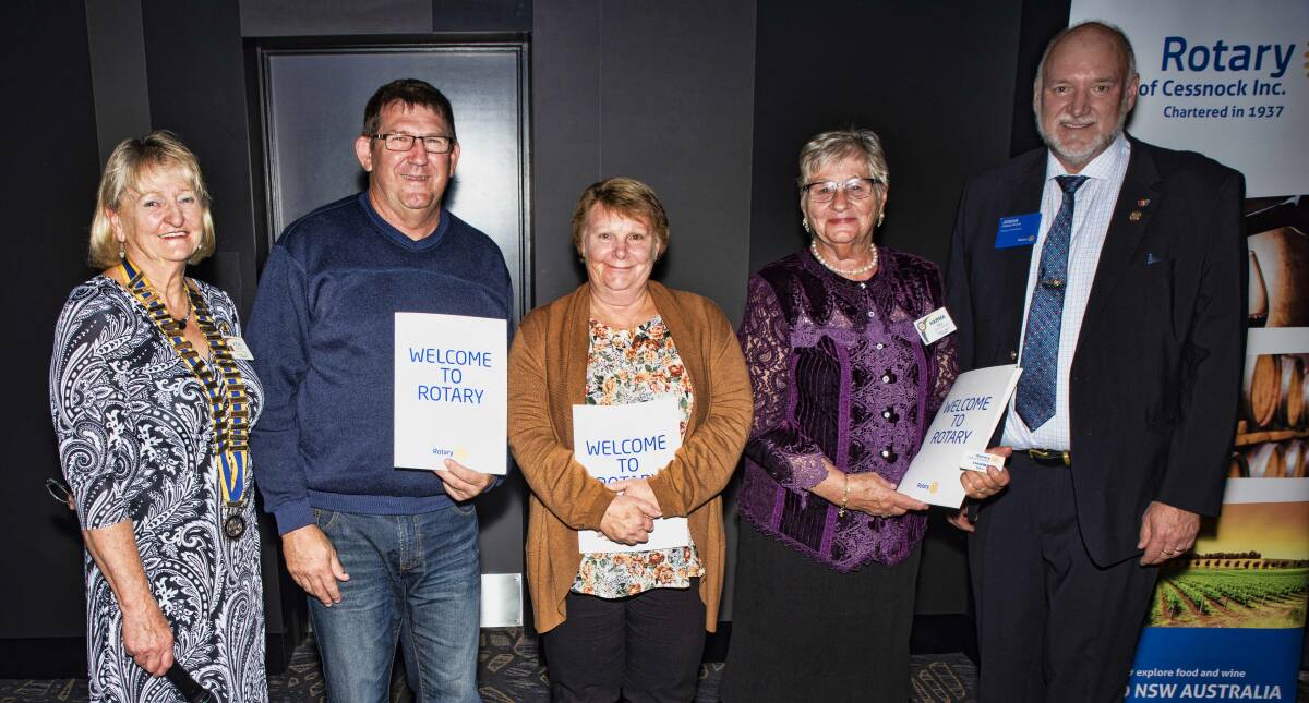 WELCOME: Rotary Club of Cessnock president Vicki Steep, new members Graham Rose, Helen Rose, and Harma Hill, and Past District Governor Adrian Roach at the club's changeover dinner. Picture: George Koncz